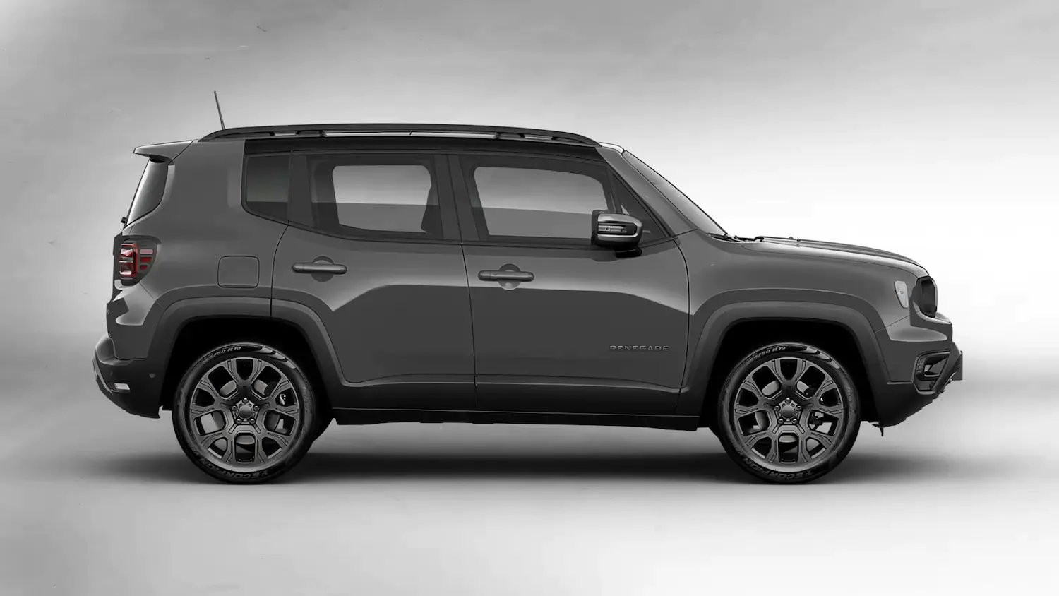 Lateral do Jeep Renegade 2024 na cor cinza escuro 